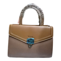 Sheonn Aimeely two-tone structured handbag in tan and taupe with a top handle and secure metal clasp closure.