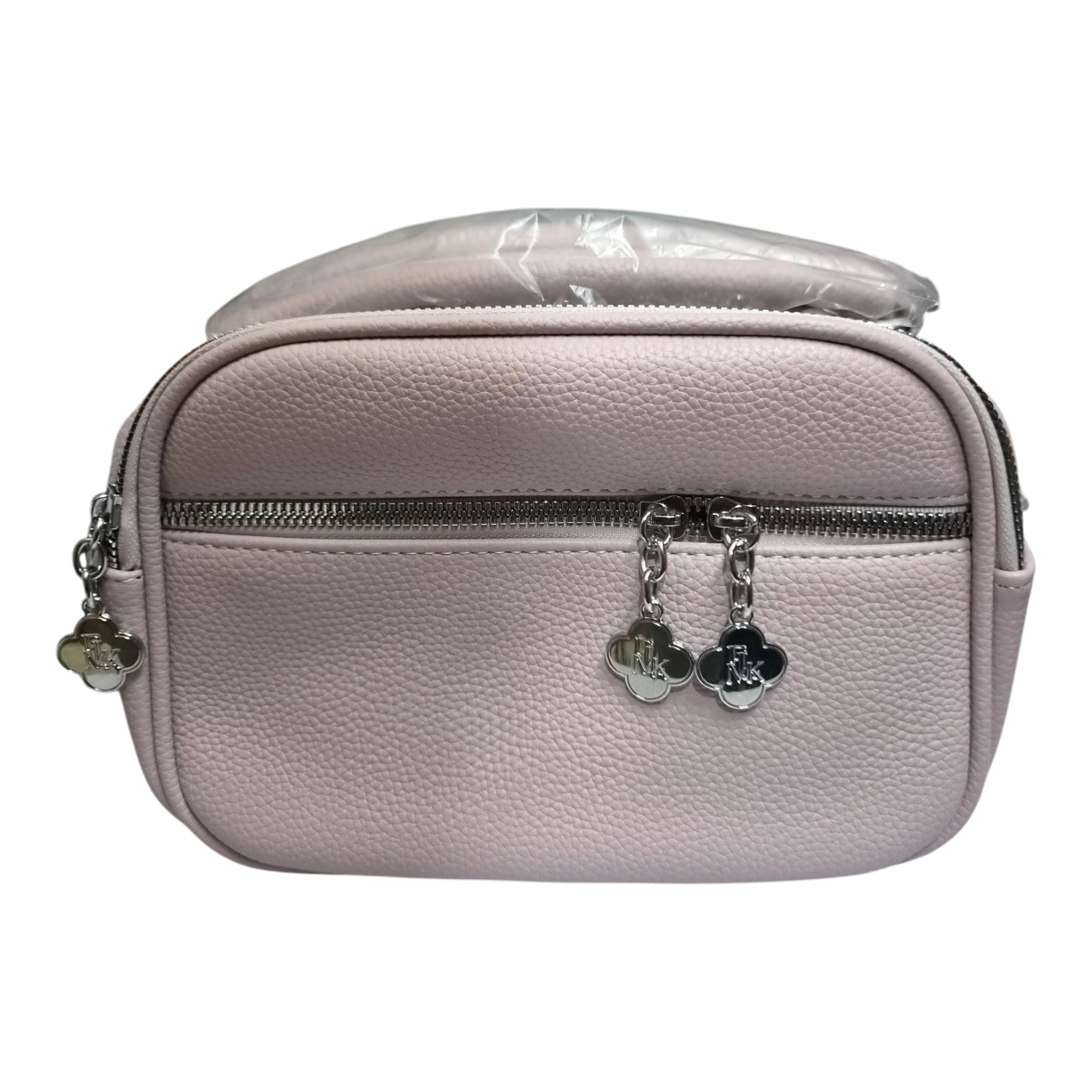 Sheonn blush pink pebble-textured faux leather crossbody bag with silver clover zipper pulls.