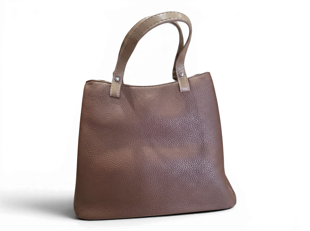 Sheonn brown faux leather tote handbag with a pebbled texture, sturdy handles, and a structured everyday design.