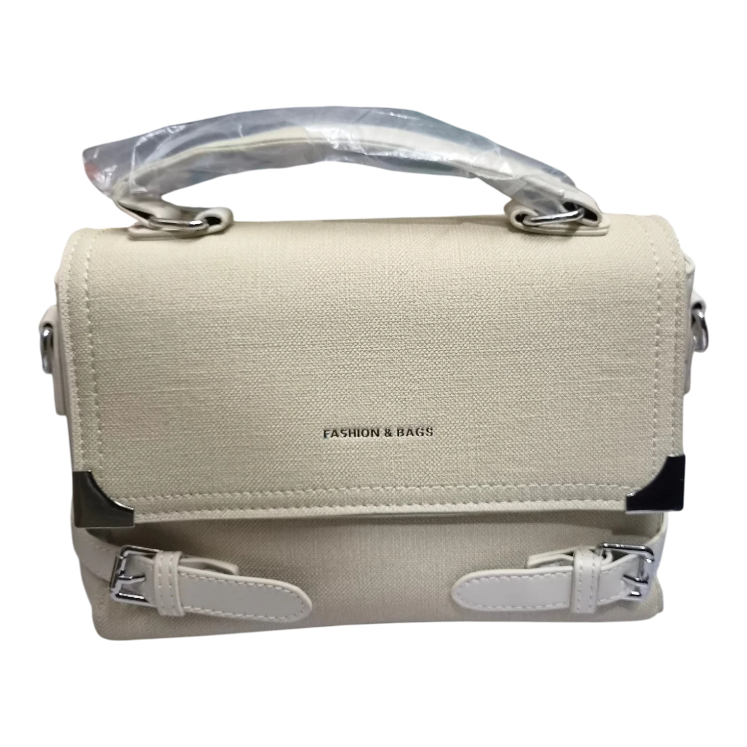 Sheonn cream textured satchel handbag with top handle, flap closure, metallic corner accents, and front buckle details.