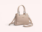Sheonn DUOYU&ANTS beige textured faux leather structured top handle handbag with silver hardware and shoulder strap.
