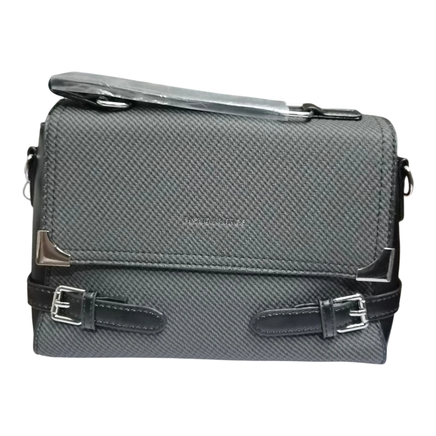 Sheonn grey textured satchel handbag with black faux-leather trim, silver hardware, and decorative buckle straps.