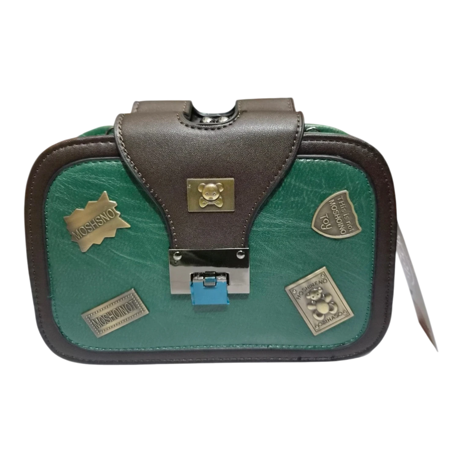 Sheonn structured faux leather crossbody bag in green and brown with whimsical metal teddy bear patches and clasp.