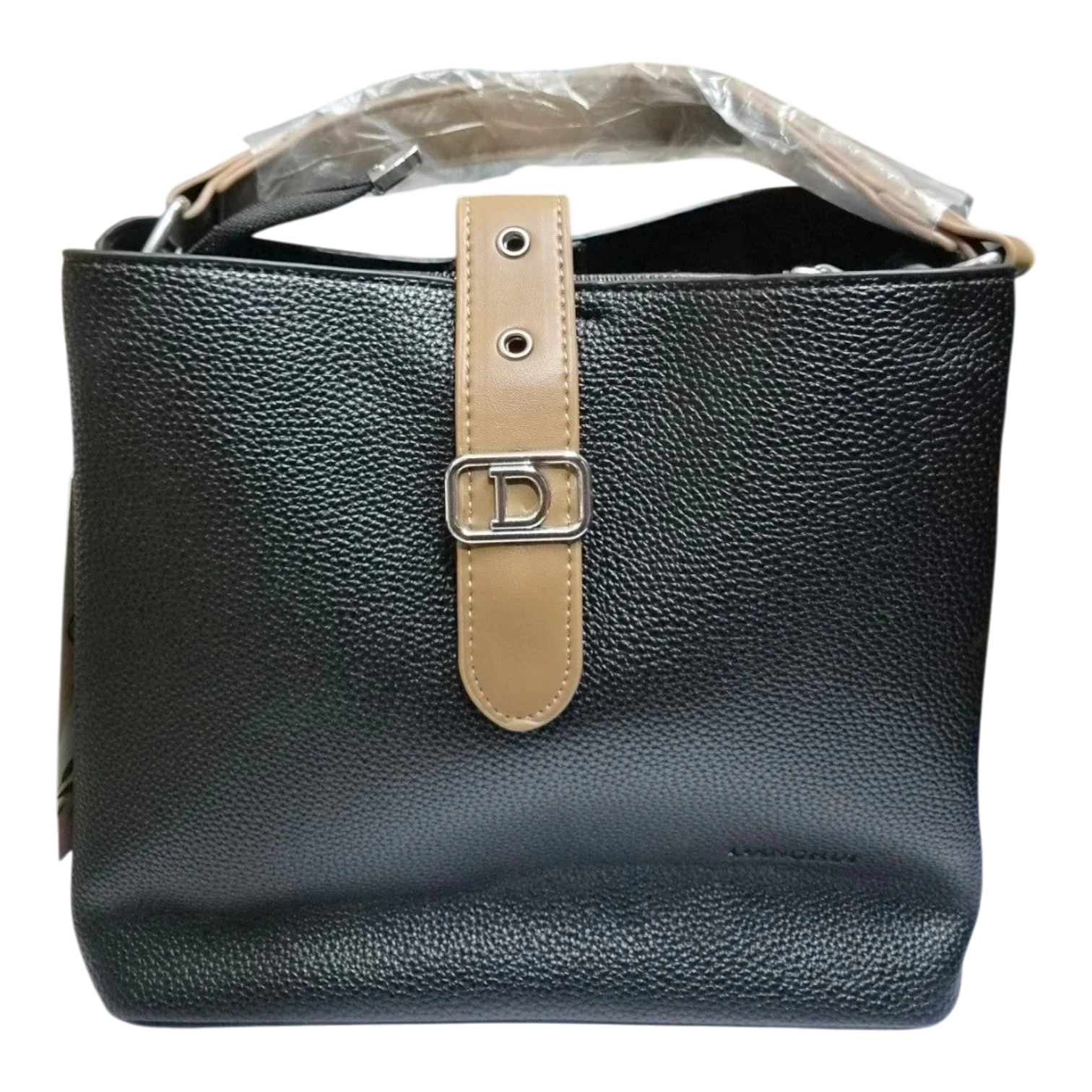 Sheonn black textured faux leather bucket handbag with a tan center strap, silver D emblem, and top handle.
